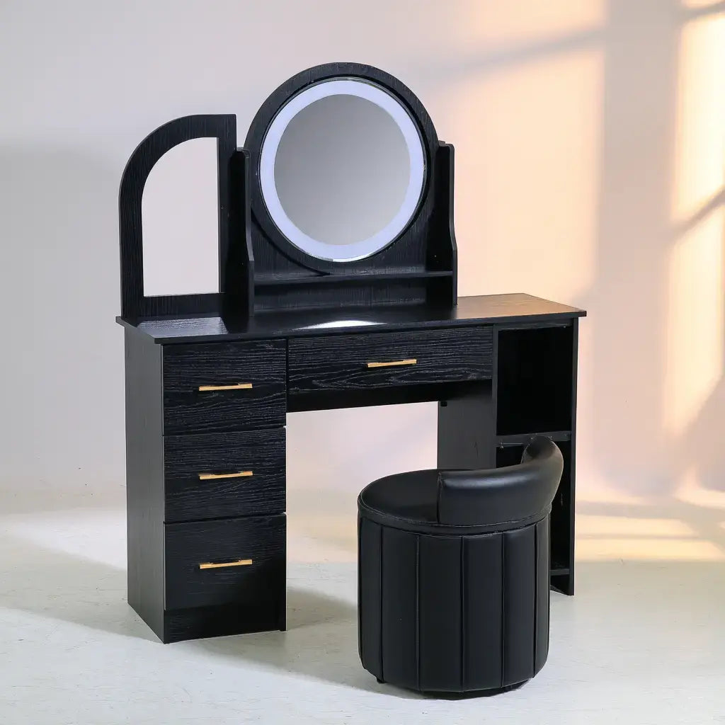Tocador negro con espejo redondo y cajonera lateral, muebles de dormitorio de la marca washablesofaco, en una habitación moderna.